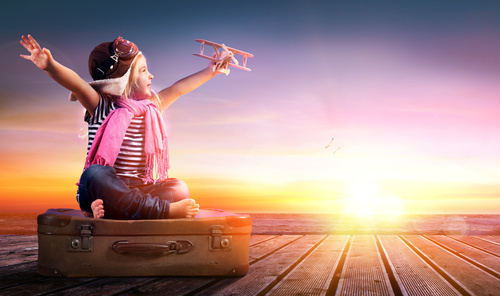 Dream journey - Little Girl On Vintage Suitcase At Sunset